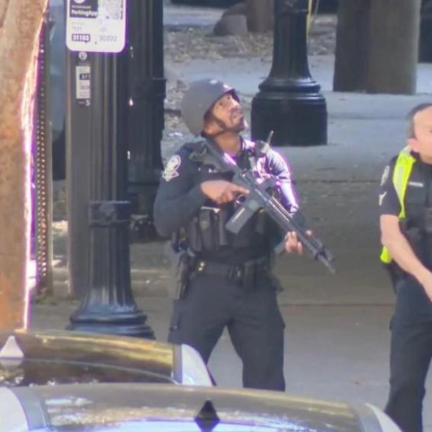 Atlanta Police in Standoff with Armed Suspect at Four Seasons Hotel