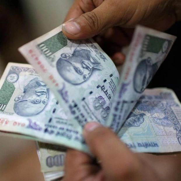 Indian Rupee Weakens Amid Strong Dollar Demand