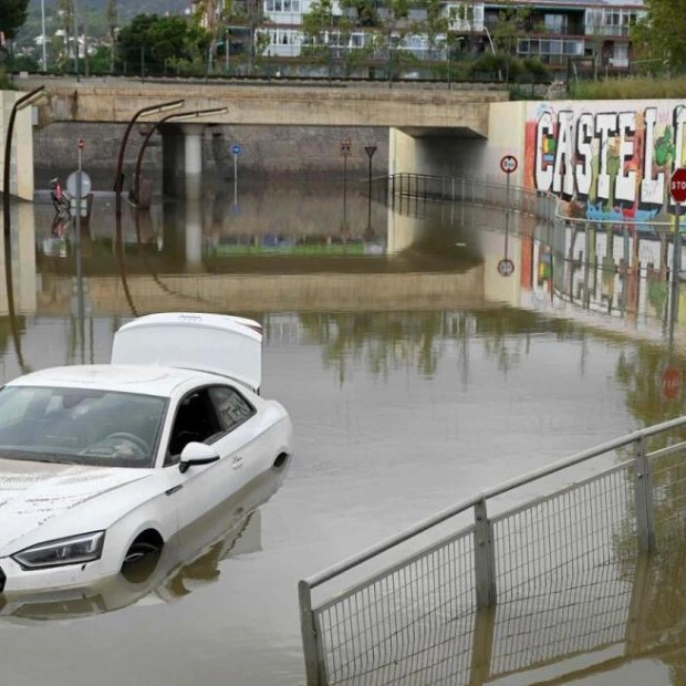 Flooded Car in Barcelona Suburbs Amid Heavy Rain