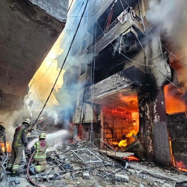 Firefighters Combat Flames After Israeli Airstrike in Beirut