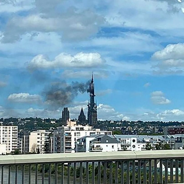 Fire Engulfs Spire of Rouen Cathedral in Northern France