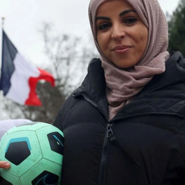 French Officials Seek Solution for Muslim Sprinter to Wear Hijab at Olympics