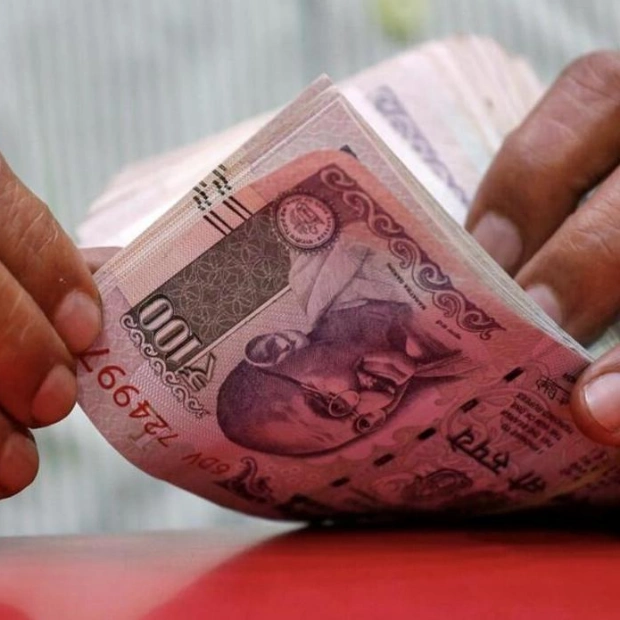 Indian Rupee Opens Slightly Lower Amid Dollar Strength