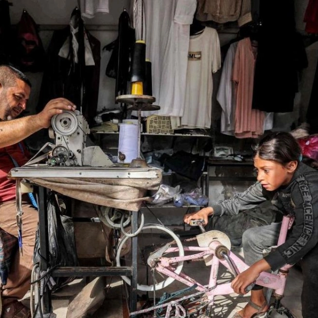 Gaza Tailor Uses Bicycle to Power Sewing Machine Amid War