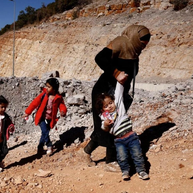 Fleeing Hostilities: A Woman Crosses from Lebanon to Syria