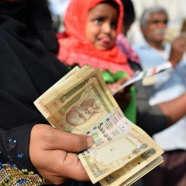 Indian Rupee Drops Amid Increased Dollar Demand