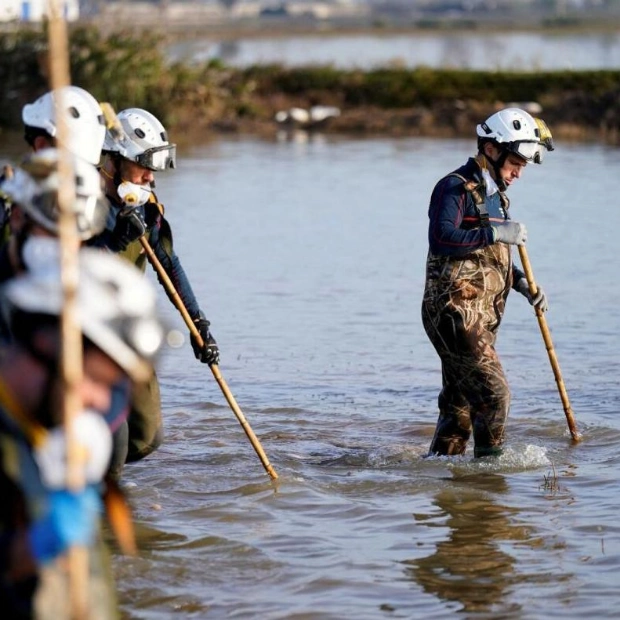 Firefighters Search for Flood Victims in Spain