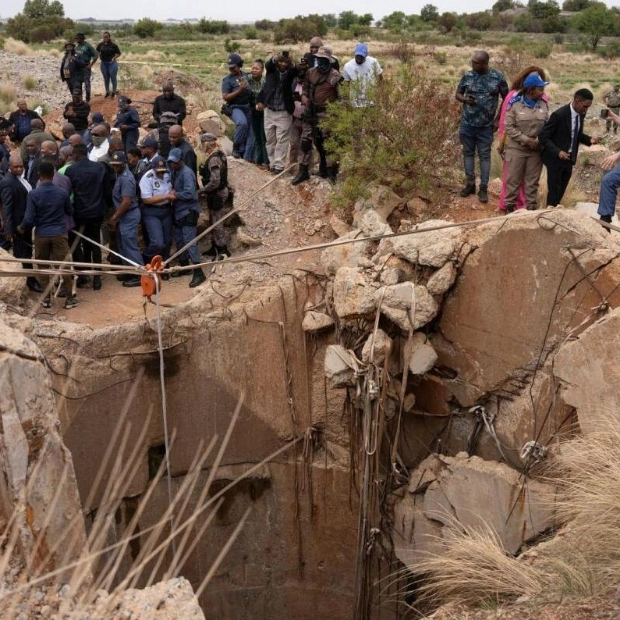 South African Police Minister Inspects Illegal Miners' Shaft