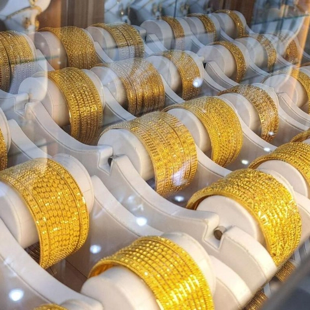 Gold Prices Dip but Stay Near Two-Week High Amid Rate Cut Expectations