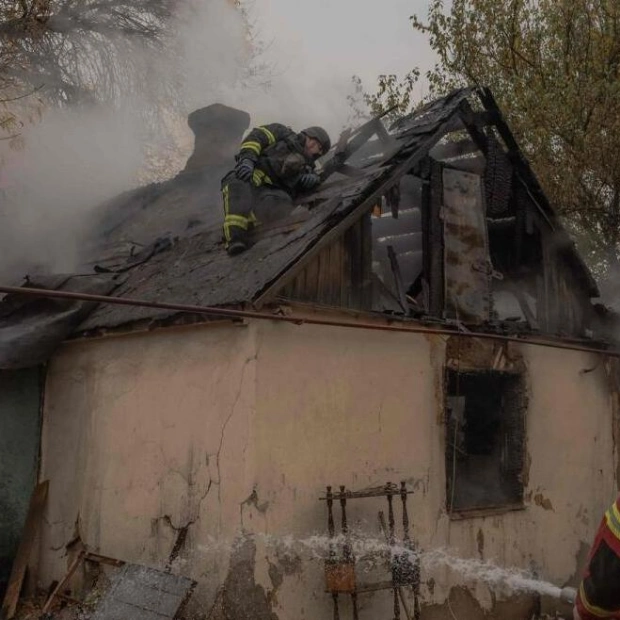 Ukrainian Firefighters Battle House Fire After Air Attack