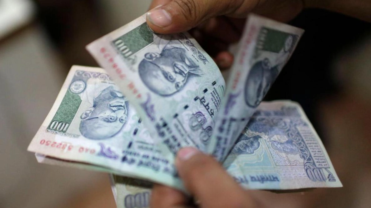 Indian Rupee Weakens Amid Strong Dollar Demand