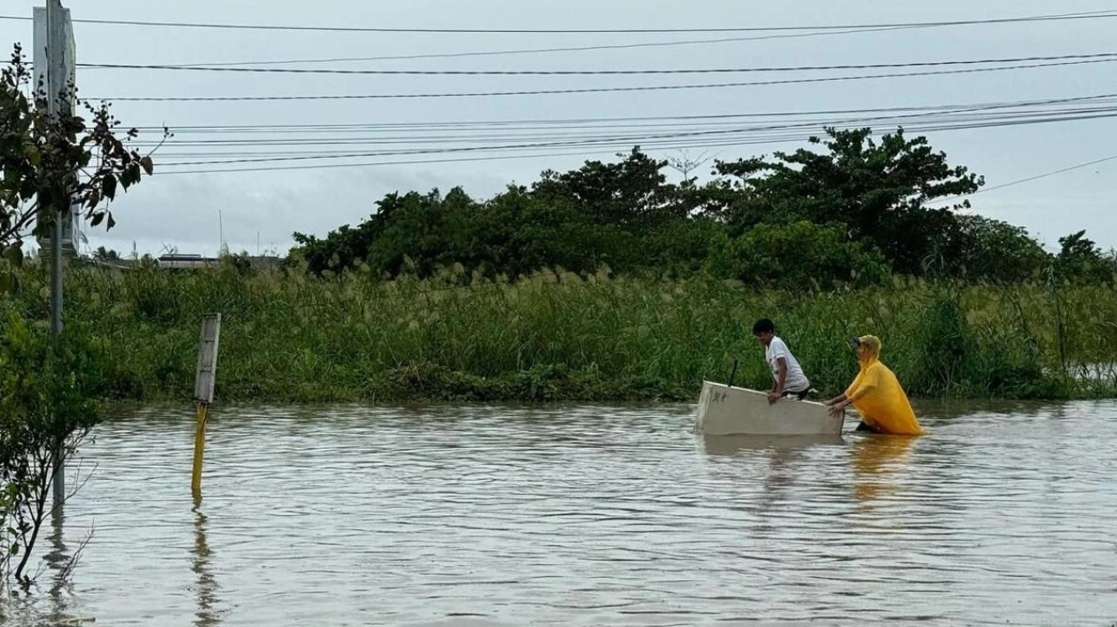 Rescuers Battle Floodwaters Amid Tropical Storm Trami