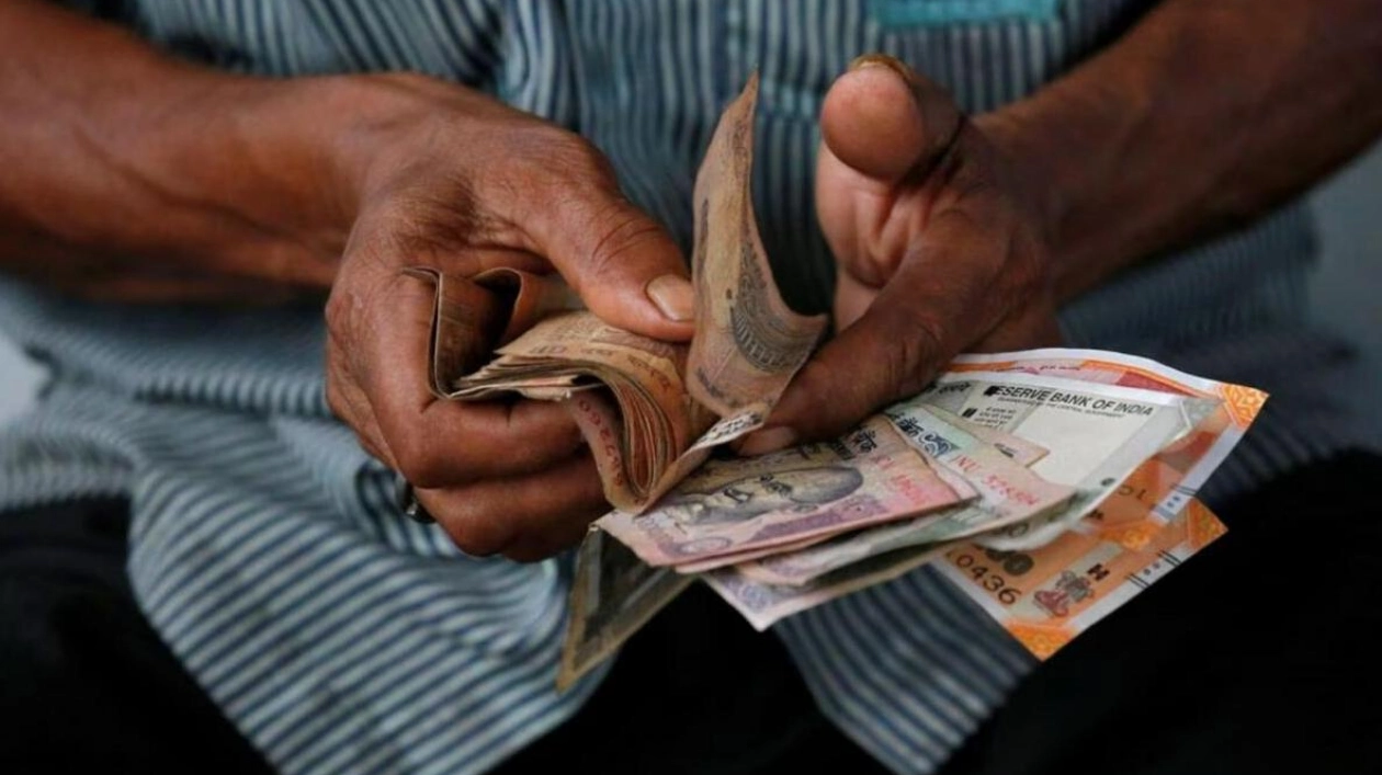 Indian Rupee Gains Amid Dollar Sales, Outlook Cautious