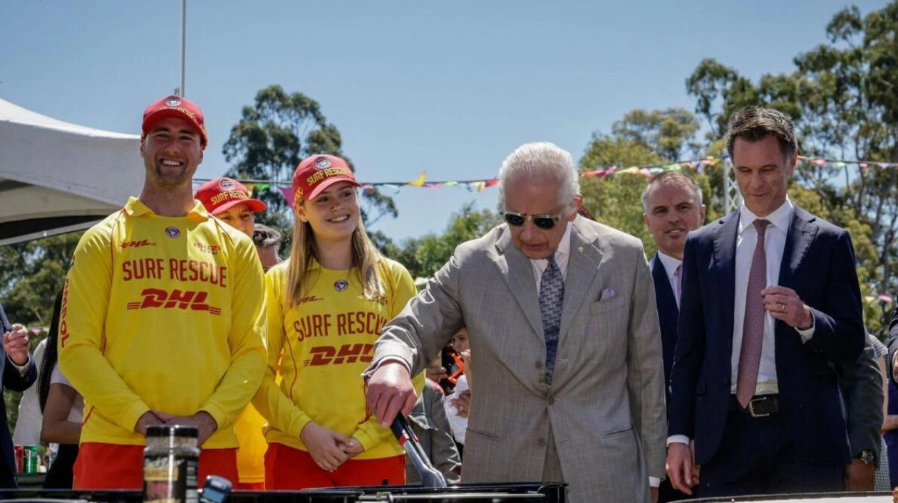 King Charles III Flips Sausages at Sydney BBQ