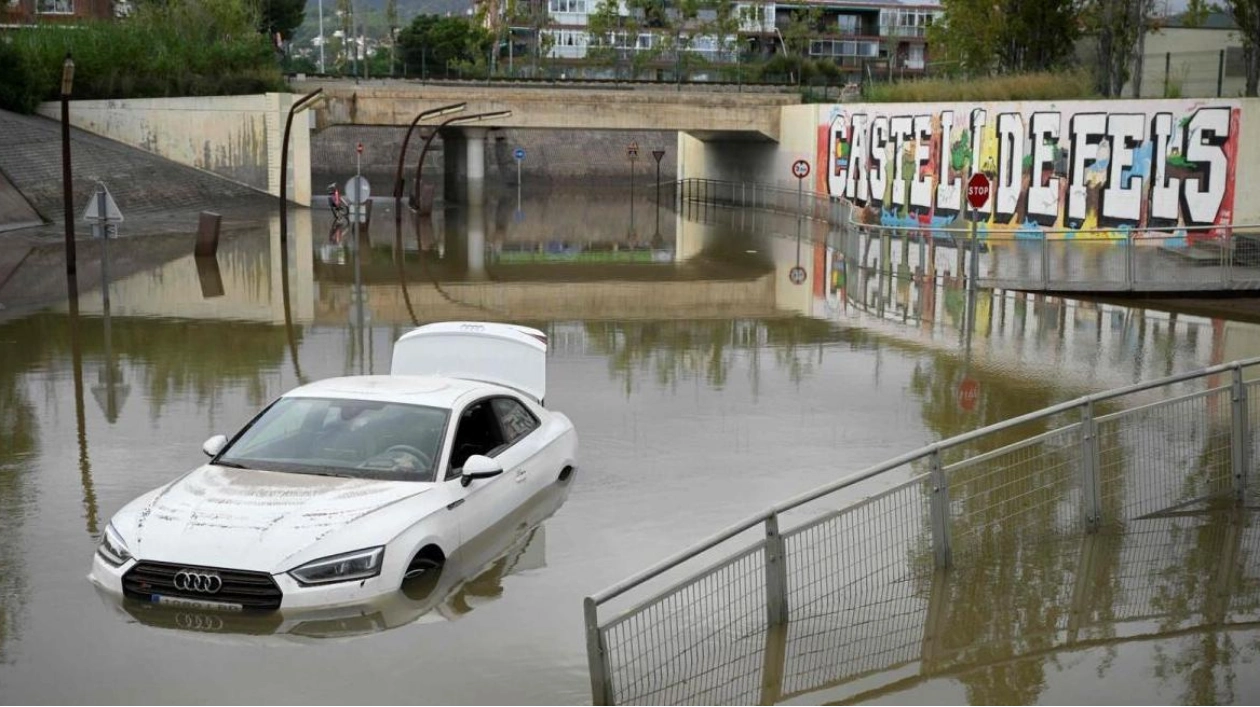 Flooded Car in Barcelona Suburbs Amid Heavy Rain