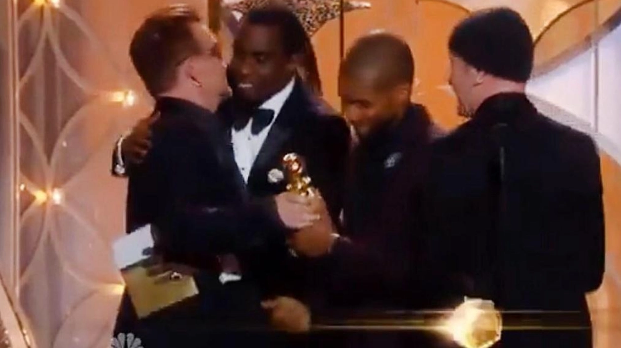 Bono Dodges Diddy's Kiss at 2014 Golden Globes