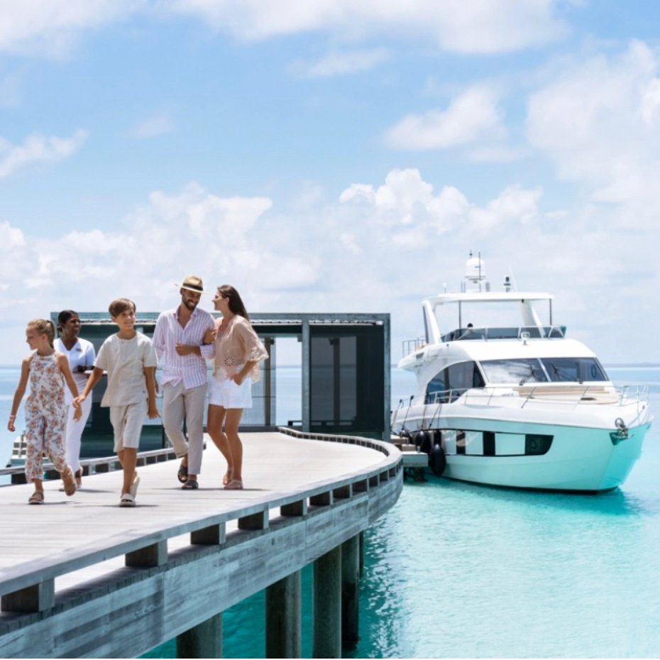 family on jetty on Maldives