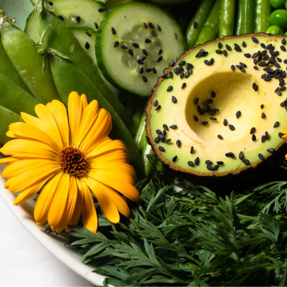 avocado near yellow flower