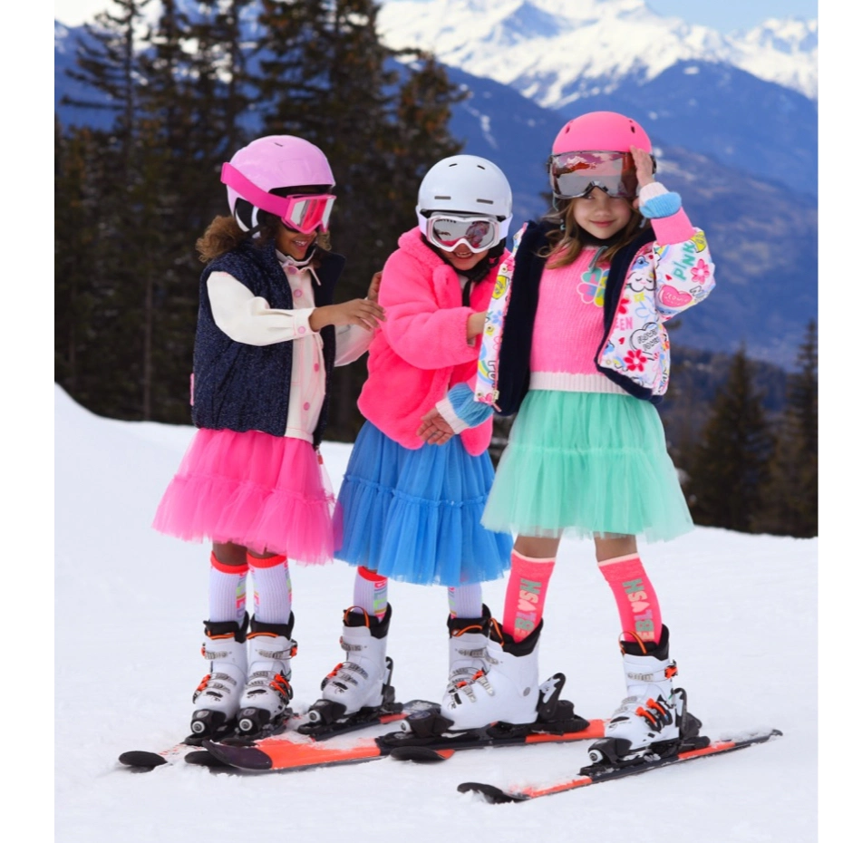 three girls skiing